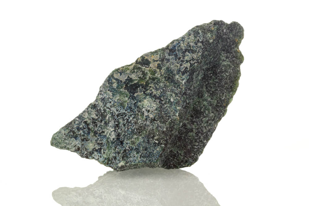 A rough dark green rock.