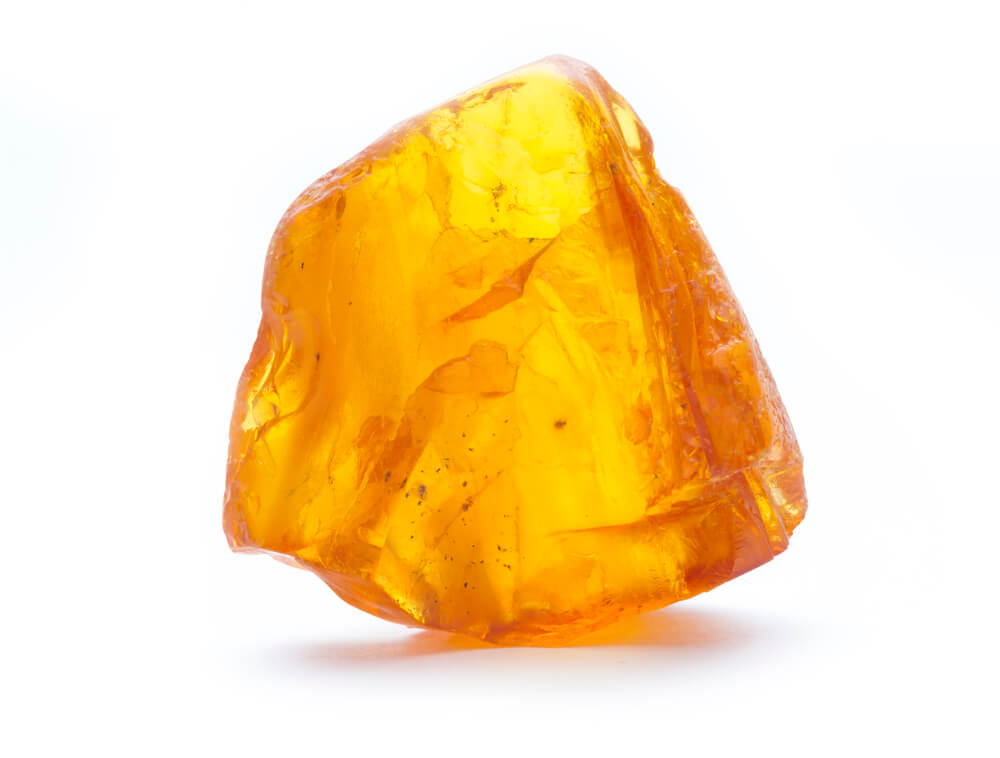 A bright orange glossy crystal.