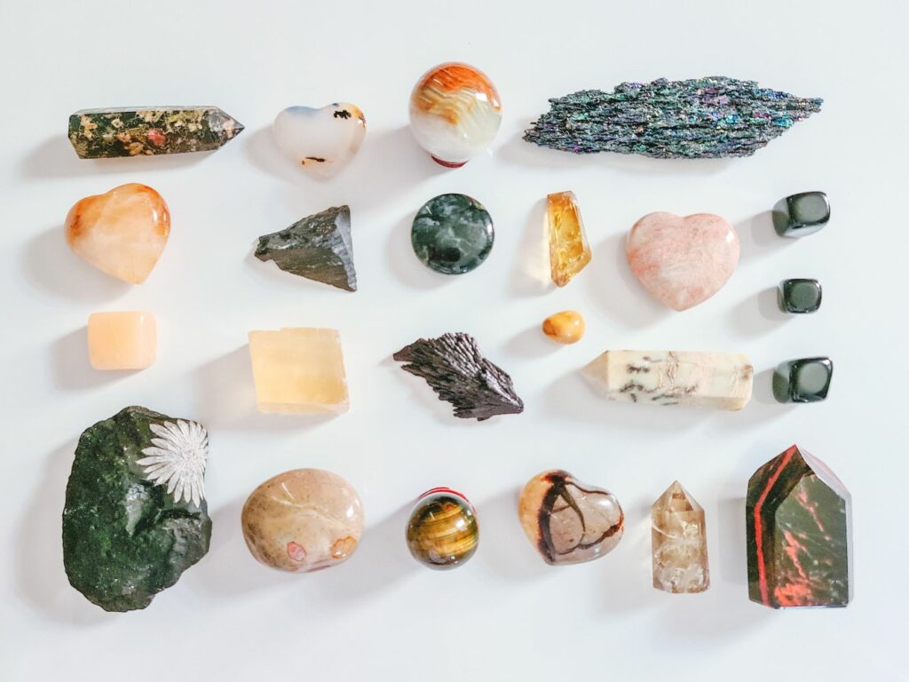 Various crystals laying on a table.