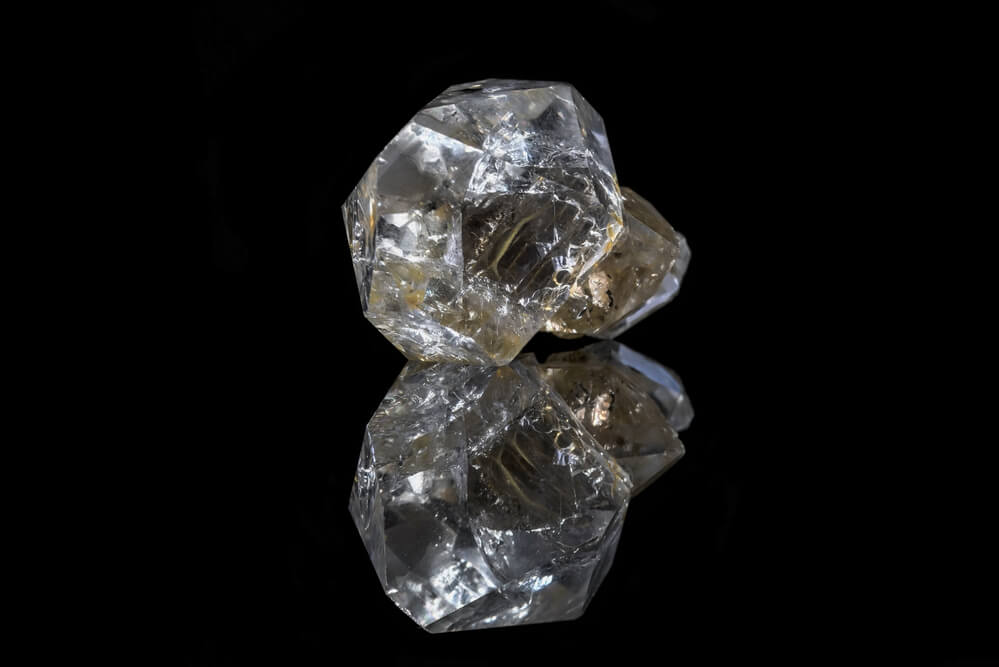 A Herkimer diamond against a black background.