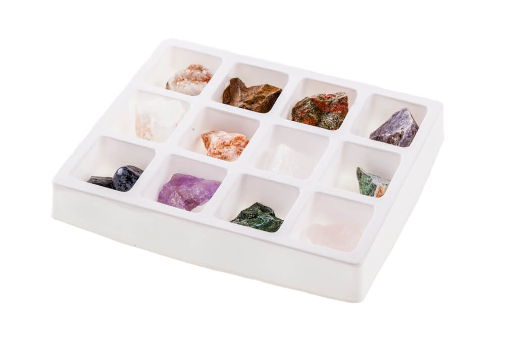 A plastic box with crystals.