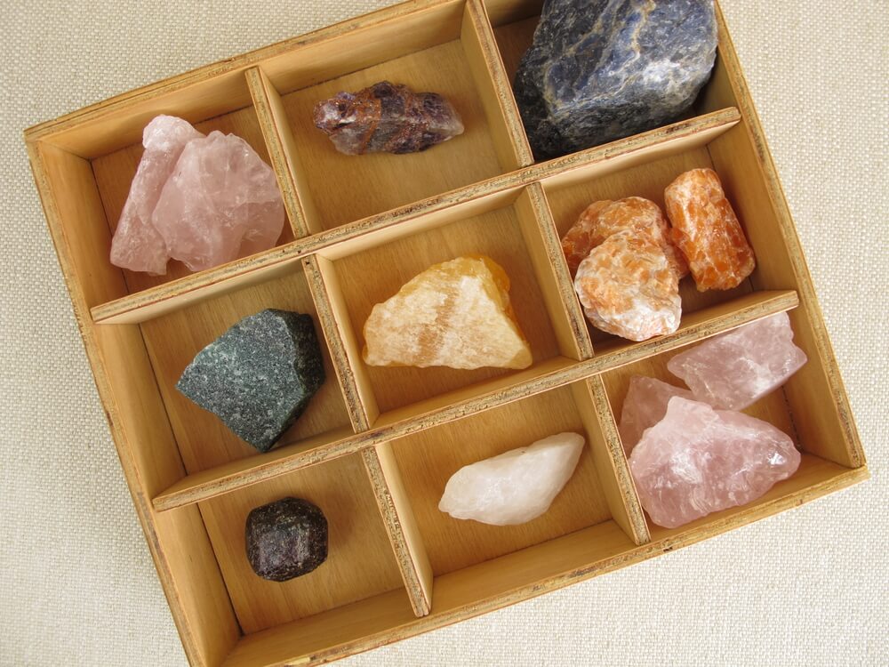 A wooden box with crystals.